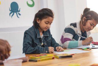 young students working at a table