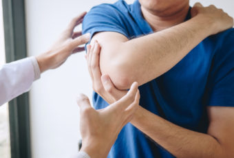 physiotherapist with patient