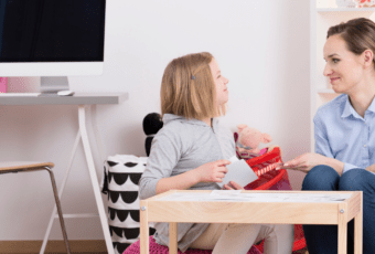 speech pathologist working with child
