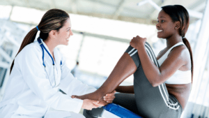 physiotherapist with patient