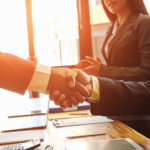 business team members shaking hands