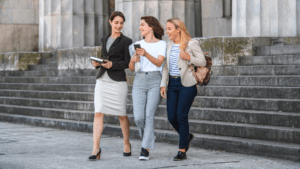 law students walking on steps of building