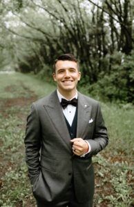 man wearing suit and bow tie