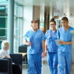 flinders medical school students wearing blue scrubs