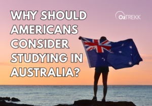 Discover your program options person holding australian flag looking out to the ocean at sunset