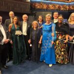 Professor Richard Robson with family members, colleagues and former PhD students and post-doctoral researchers at the Nobel Prize ceremony. Picture: Holly Watkins/University of Melbourne